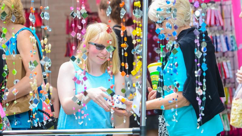 Girl looking at crystal display