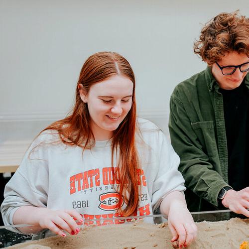 Eryn Bloom smiles while working in the Hydrology lab